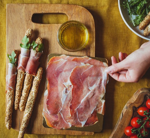Ham Carefyrddin sliced on board
