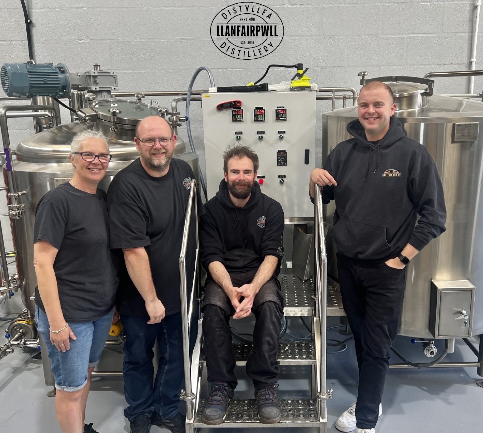 Llanfairpwll Distillery founder Rob Laming and team