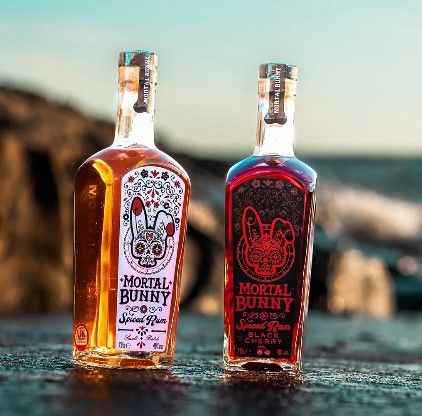 Mortal Bunny bottles on shore