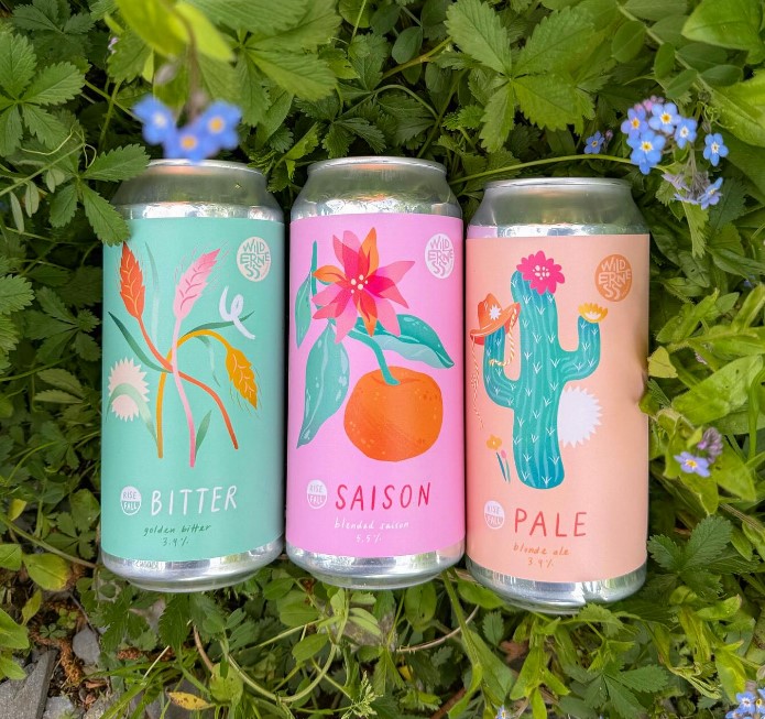 Wilderness Brewery cans in foliage